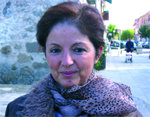 María, asesora inmobiliaria.
